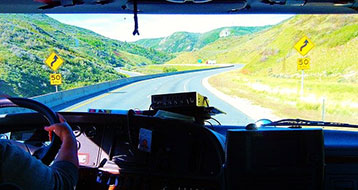 Looking at a road through a truck windshield